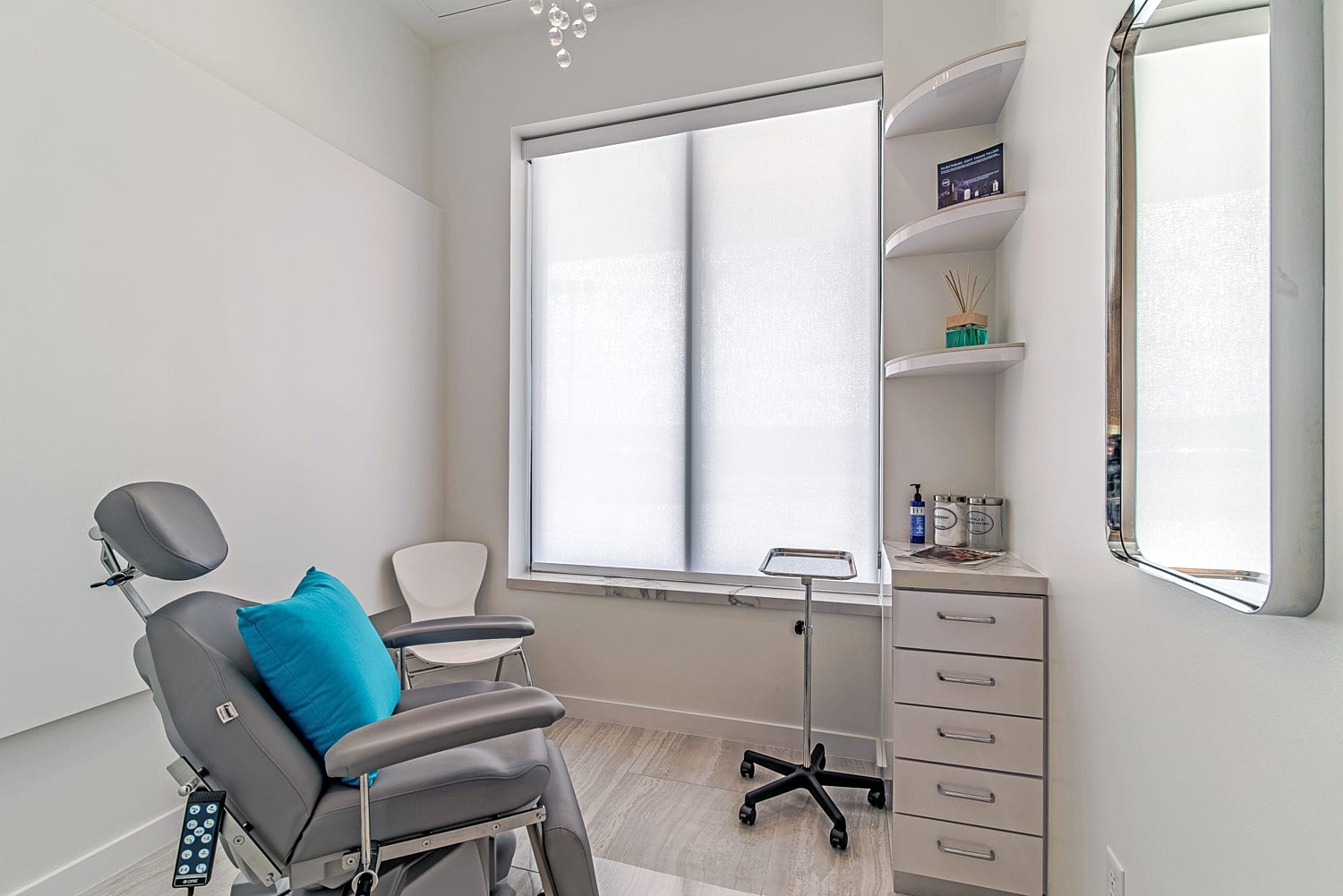 Clean, modern medical examination room interior.