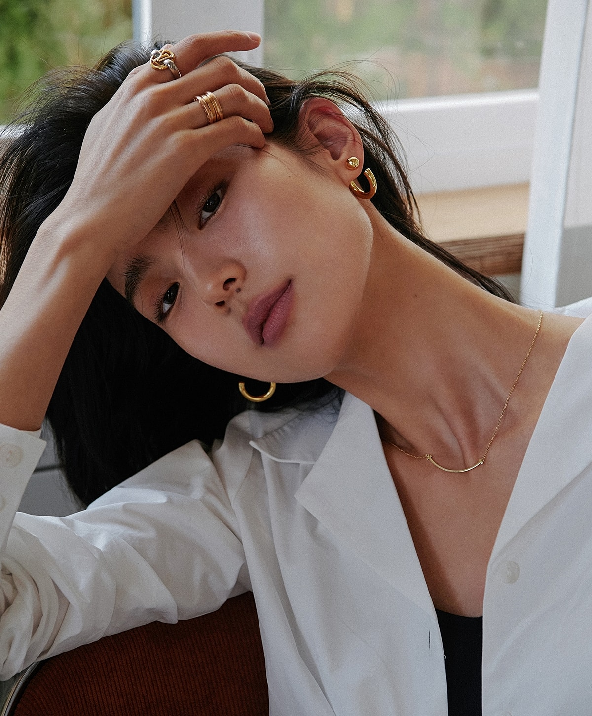 Model in blue activewear striking a pose.